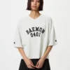 Babymonster UT cropped T-shirt met print voor dames | V-hals