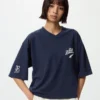Babymonster UT cropped T-shirt met print voor dames | V-hals