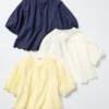 Damesblouse met borduursels en halflange mouwen