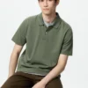 Unisex AIRism katoenen piqué Poloshirt