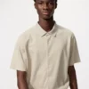 Unisex AIRism katoenen piqué Poloshirt met volledige opening