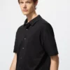 Unisex AIRism katoenen piqué Poloshirt met volledige opening